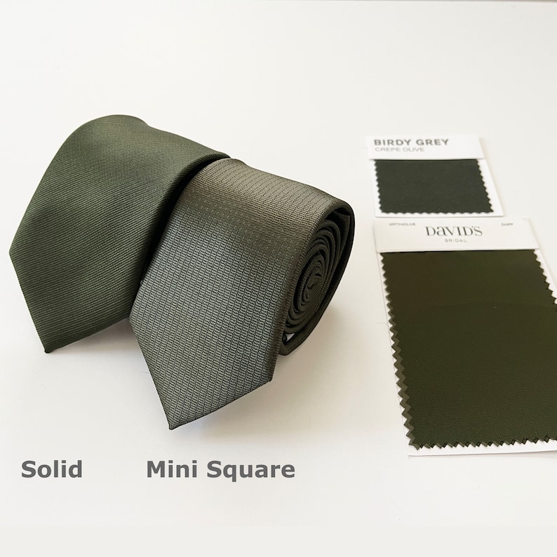 May include: Two olive green neckties, one solid and one with a mini square pattern, are displayed. Color swatches from "Birdy Grey" and "David's Bridal" are included, with the text "Solid" and "Mini Square" at the bottom.