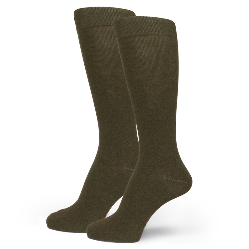 May include: Two olive green knee-high socks. The socks are made of a soft, ribbed knit material. The socks are displayed on a white background.