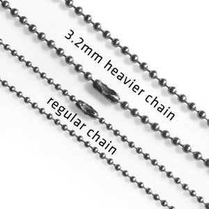 May include: Three silver ball chains of different sizes. The top chain is labeled "3.2mm heavier chain" and the bottom chain is labeled "regular chain".