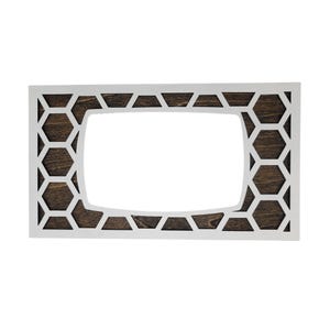 May include: A white picture frame with a honeycomb pattern border. The frame is made of wood and has a dark brown stain. The frame is empty and ready for a picture.