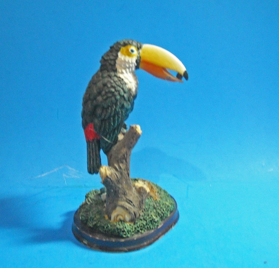 Toco Toucan on tree figurine
