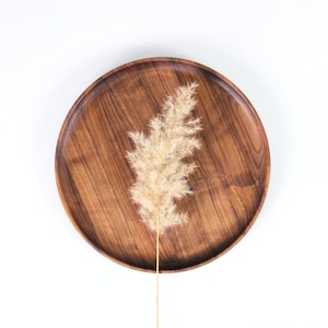 Walnut Wood round serving plate, a timeless piece for elegant dining