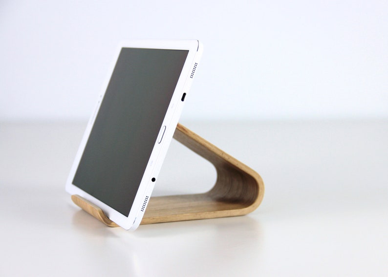 Minimalist bentwood design wooden iPad stand holding a tablet, perfect for hands-free use in the kitchen, office, or home