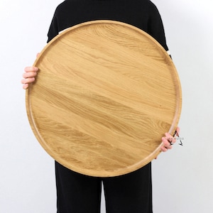 Rond dienblad. Eikenhouten Ottomaanse dienblad Ronde schaal voor salontafel.