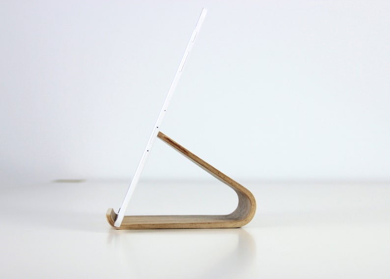 Minimalist wooden iPad stand holding a tablet, perfect for hands-free use in the kitchen, office, or home
