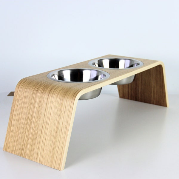 Personalized wooden raised food stand with two stainless steel bowls for large breed dogs.