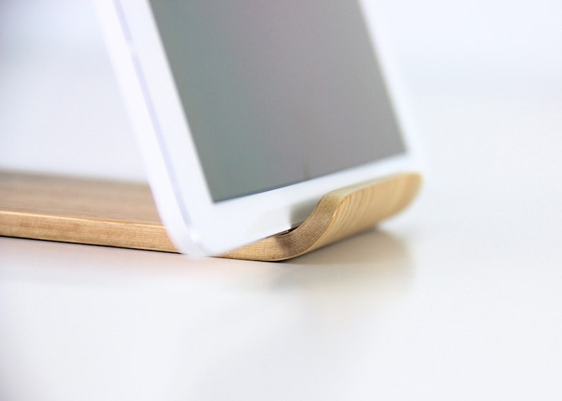Minimalist wooden iPad stand holding a tablet, perfect for hands-free use in the kitchen, office, or home