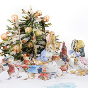 Cardologie - Peter Rabbit kerstpop-upkaart - Beatrix Potter-cadeaus - Baby's First Christmas Card - officieel gelicentieerd