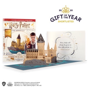 May include: A Harry Potter themed handmade pop-up card featuring a detailed paper model of Hogwarts castle. The card displays the text Here, help will always be given to those who ask for it... What's inside? and includes a 2020 Gift of the Year logo.