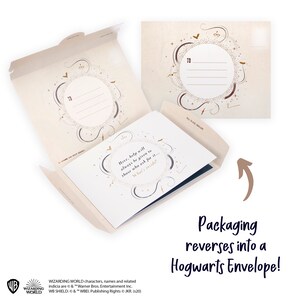May include: A cream-colored stationery set featuring a foldable envelope and a matching card. The envelope has a circular gold-dotted frame with decorative icons. The card displays the text: Here, help will always be given to those who ask for it.