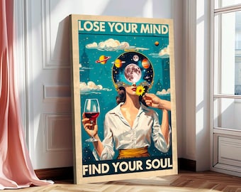 May include: A framed art print with the text "LOSE YOUR MIND FIND YOUR SOUL". The artwork depicts a woman holding a glass of red wine, with a celestial design replacing her head. The background is teal with planets and clouds.