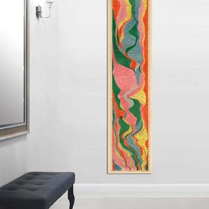 May include: A vintage-style poster with the title "The Histomap" and a colorful timeline of historical events. The timeline is divided into sections representing different periods of history, with each section colored differently. The poster is printed on a cream-colored background.
