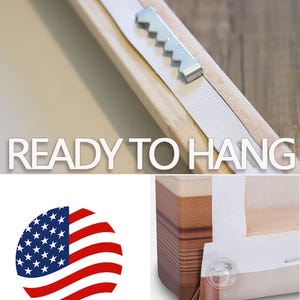 May include: A close-up of a wooden frame with a metal sawtooth hanger attached to the back. The frame is labelled "READY TO HANG" and has a "MADE IN USA" sticker on the front. The frame also has clear plastic corner bumpers.