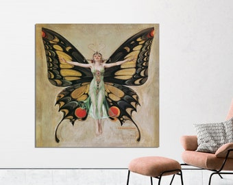 May include: A woman dressed in a green gown with a butterfly design, standing in front of a large butterfly with black and yellow wings. The butterfly has red accents on its wings.
