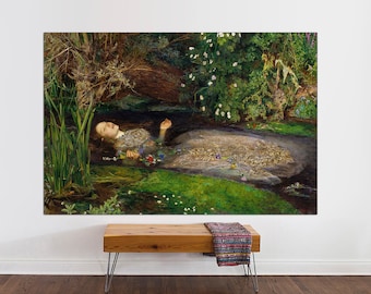 May include: A painting of a woman lying in a stream of water surrounded by lush greenery. The woman is wearing a white dress and has long, dark hair. The water is clear and the light is soft and diffused. The painting is a classic example of Pre-Raphaelite art.
