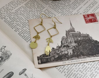 geometric sun earrings in golden brass