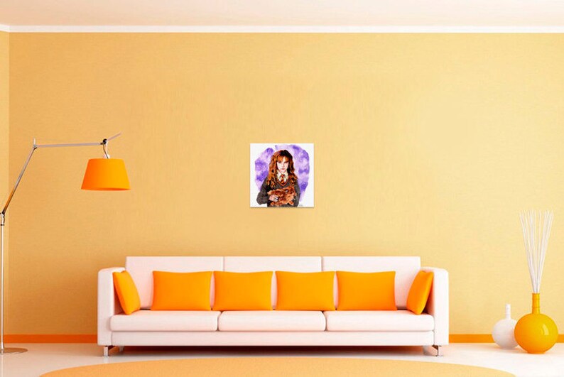 May include: A square wall art print featuring a watercolor illustration of a young person with long wavy brown hair, wearing a grey sweater, white collared shirt, and a striped tie, holding a brown cat against a purple abstract background.