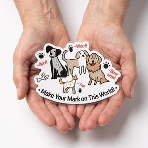 May include: A clear sticker featuring cartoon dogs with speech bubbles saying "Arrf!", "Woof!", "Yip!", and "Bow-wow!". The sticker has the text "Make Your Mark on This World!" in a black font.
