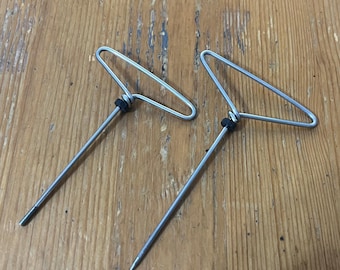 Handmade pokers crafted from recycled bike spokes.