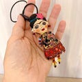 OOAK Frida Art Doll Brooch - Handmade Textile Pendant Necklace - Wearable Collectible Art Jewelry product logo