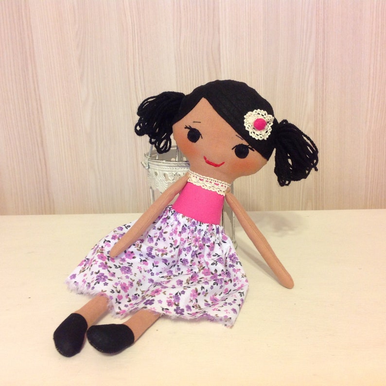 black fabric dolls