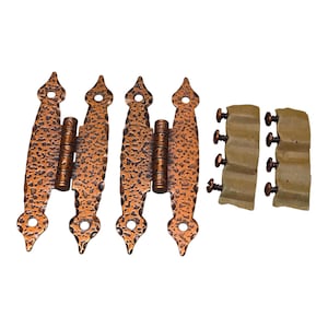 May include: Four antique copper-colored hinges with a hammered texture and decorative pointed ends. Two sets of mounting blocks with screws are also included. These hinges are suitable for cabinets or doors.
