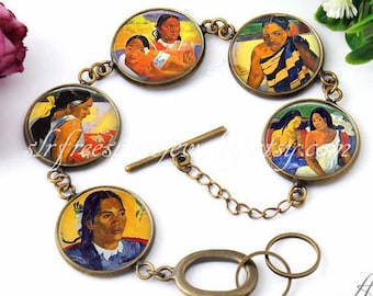 May include: A bronze bracelet with five round glass charms featuring paintings of Tahitian women. The charms are connected by a chain with a toggle clasp.