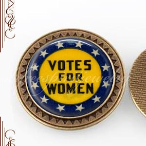 May include: A vintage-style button with a blue and yellow design. The button features a white star pattern around the edge and the text "Votes for Women" in black lettering.