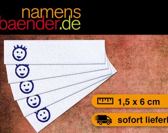 May include: Five white fabric labels with a blue smiling face icon. The labels are stacked on top of each other. The labels measure 1.5 inches by 6 inches. The text "sofort lieferbar" is visible in the lower right corner of the image.