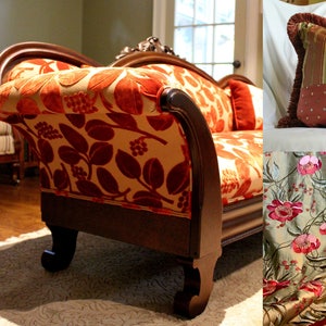 May include: A collection of home decor items featuring a floral theme. Includes a sofa with orange leaf-patterned upholstery, a decorative pillow with a patchwork design, and floral curtains. The color palette is warm, with shades of red, orange, and gold.
