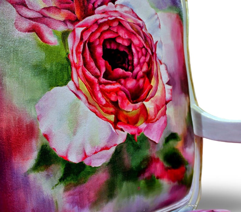 May include: A white chair with a floral patterned fabric seat. The fabric features a large pink rose with white petals and green leaves. The background is a watercolor wash of pink, purple, and green.