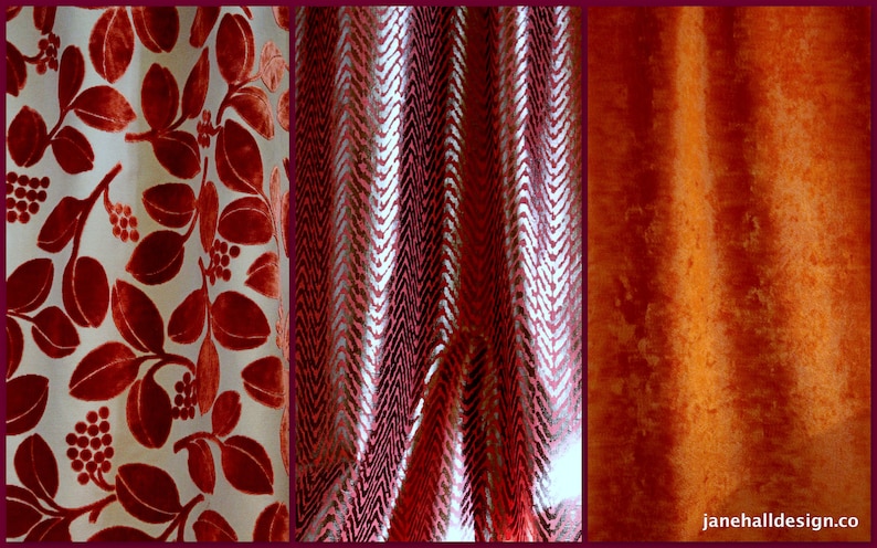 May include: A collage of three fabric swatches. The first features a white background with a repeating pattern of red leaves and berries. The second has a red and silver chevron design. The third is a solid orange-red fabric.