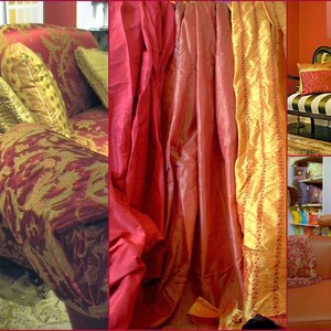May include: A red and gold patterned sofa with pillows and a red and gold patterned throw blanket. The sofa is in a room with red and gold curtains.