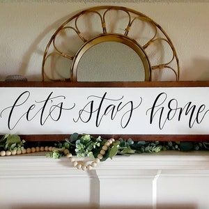 Let&#39;s Stay Home // Homebody Sign // Farmhouse Wall Decor Above Bed or Mantle Sign // Entryway Whitewashed Sign // Calligrapy Lettered