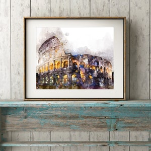 May include: A watercolor painting of the Colosseum in Rome, Italy. The painting is in a gold frame and is hanging on a rustic wooden shelf.