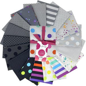 May include: A collection of folded fabric squares arranged in a circular fan pattern. The textiles feature various patterns including polka dots, stripes, triangles, and star motifs in shades of gray, black, white, purple, blue, orange, and yellow.