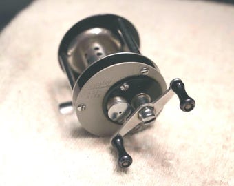 3d Printed Wall Mounted Bait Caster Reel Holder - Etsy 3d Printed Wall Mounted Bait Caster Reel Holder - Etsy