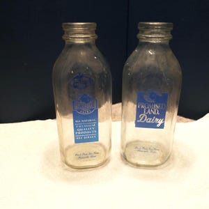 2 Glass milk Bottles, Promised land dairy bottles