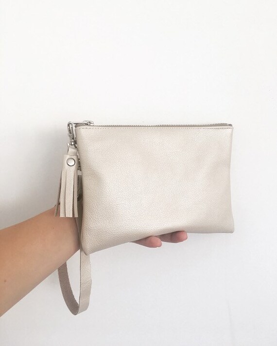 cream leather clutch bag