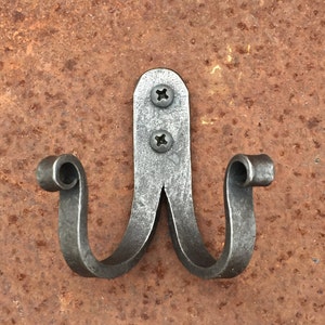 Double hook with scroll ends.