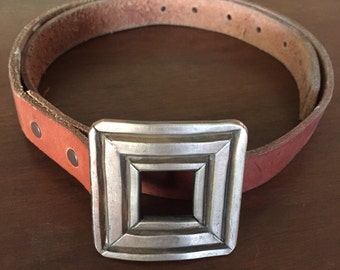 Bronze belt buckle.