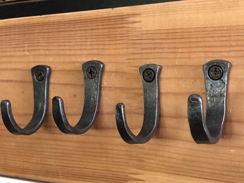 Small hooks set of four and hand in America. Etsy