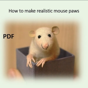 Könnte beinhalten: Eine weiße Maus mit schwarzen Augen sitzt in einer kleinen violetten Box. Die Maus hat eine rosa Nase und schaut in die Kamera. Der Text "PDF" befindet sich in der oberen linken Ecke des Bildes. Das Bild ist mit "Wie man realistische Mäusepfoten macht" betitelt.
