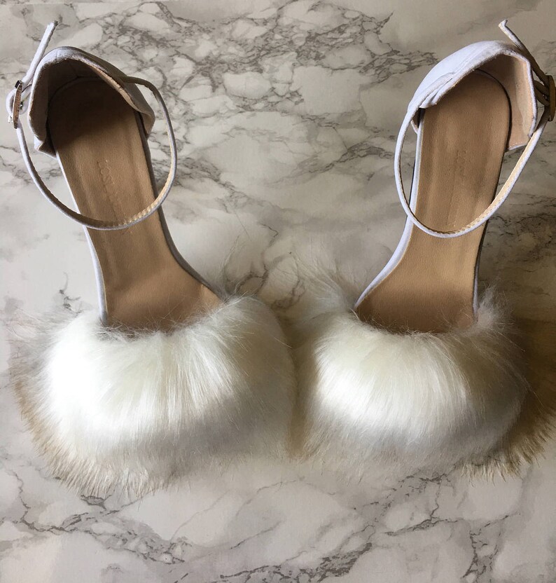 white fluffy flip flops