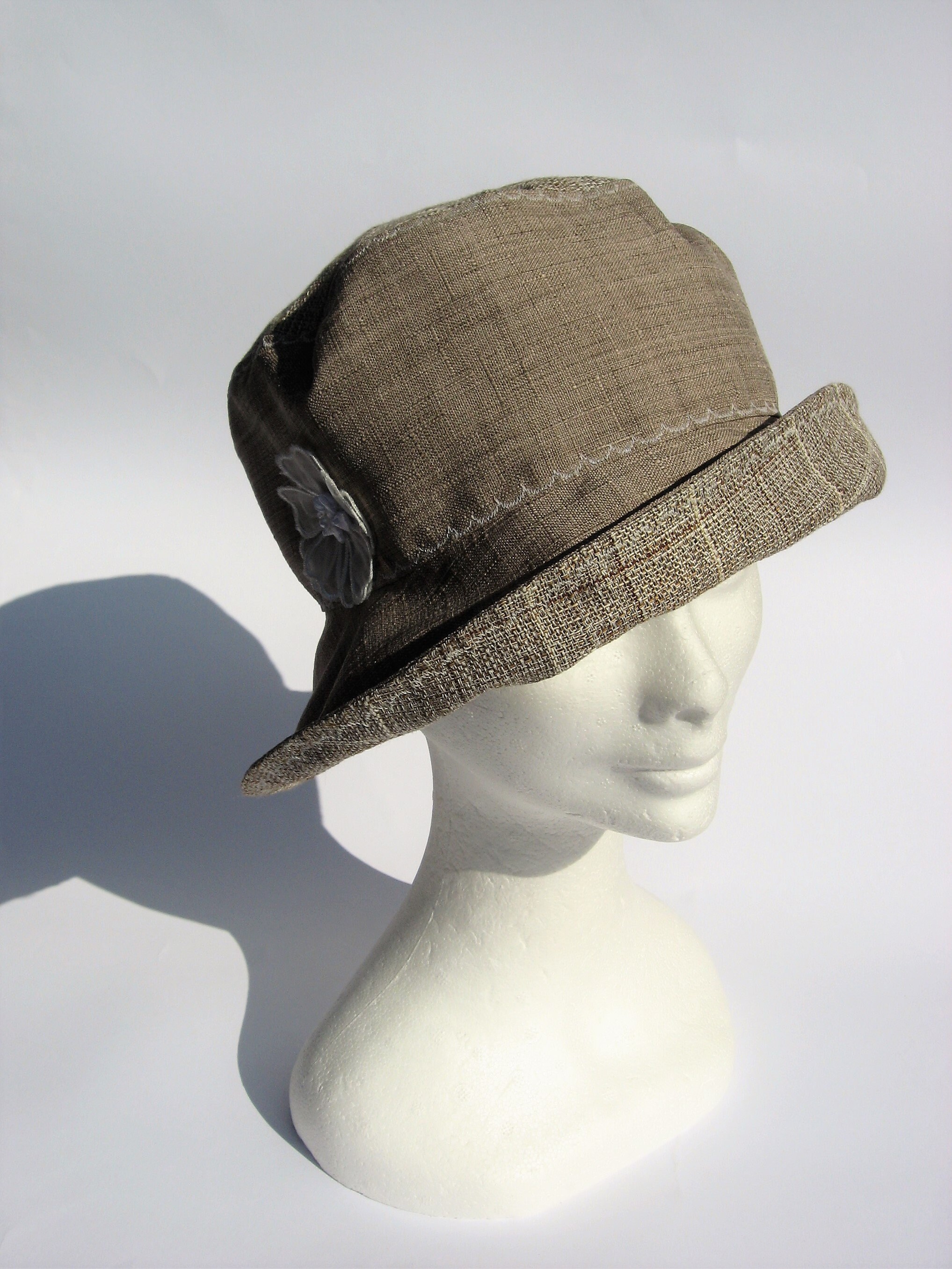 beige floppy hat
