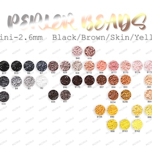 May include: An assortment of small, round, plastic beads in various colours, including black, brown, skin tones, and yellow. The beads are arranged in rows and labelled with numbers. The text "mini-2. 6mm Black/Brown/Skin/Yellow" is at the top of the image.