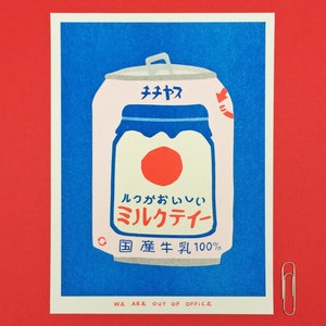 A risograph print of a japanese can of milky tea from a vending machine