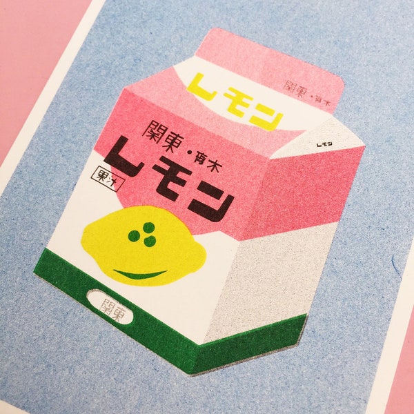 A risograph print of a box of lemon milk