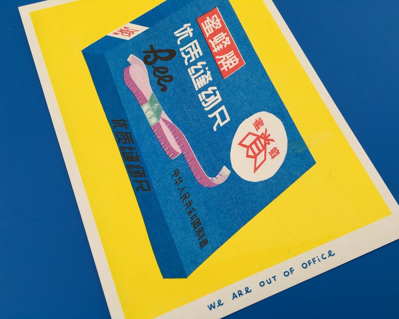 A risograph print of a box full of colourful cloth rulers image 3