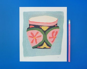 A risograph print of a painted flowerpot.
